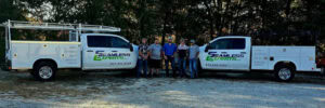 the team and work trucks at Seamless Experts residential and commercial exterior remodeling Ozarks Missouri
